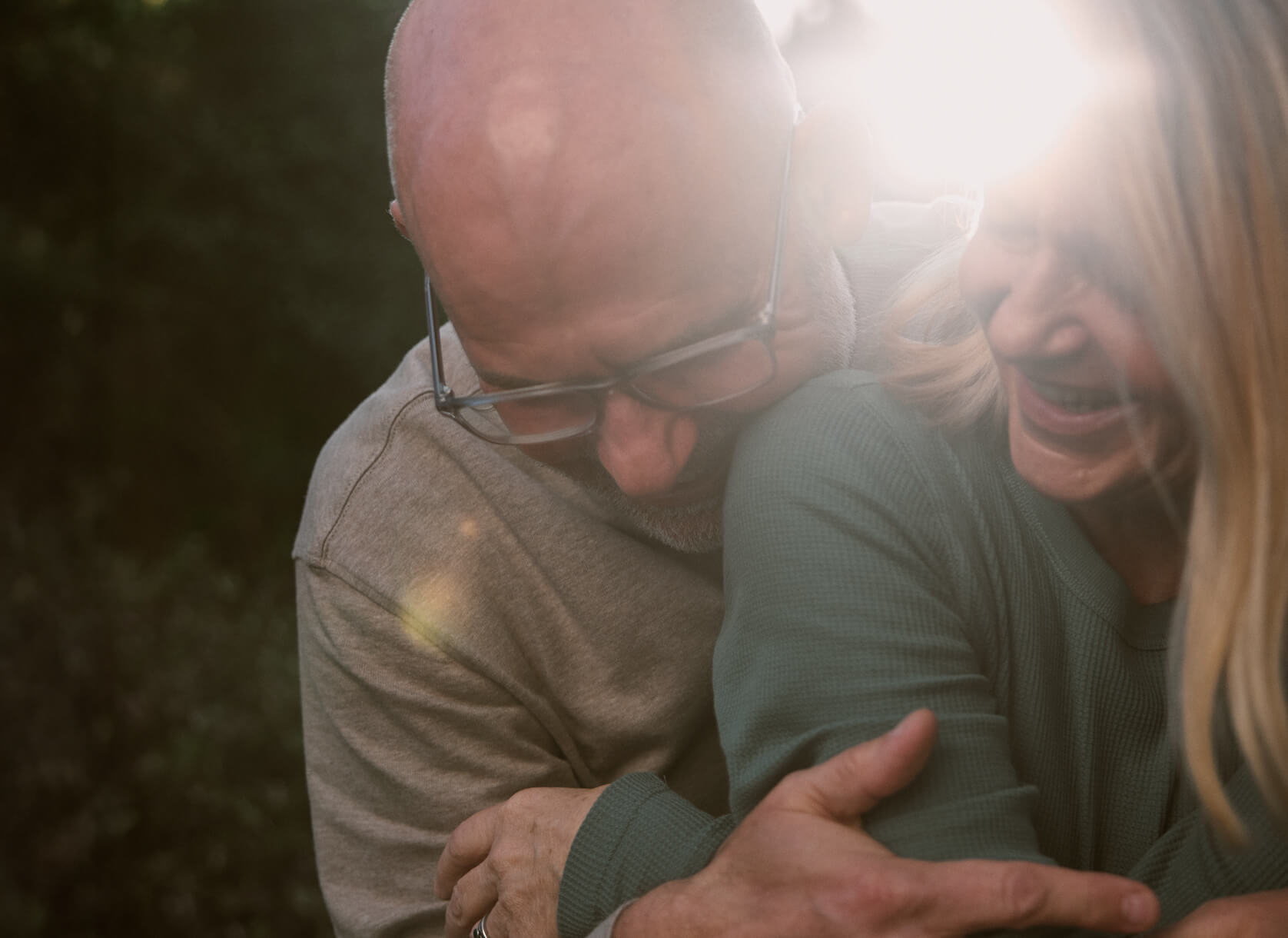 A man and woman laughing